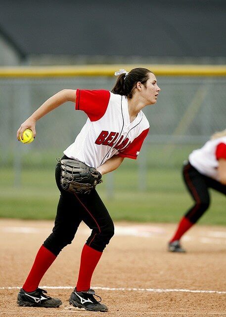 softball player with red socks